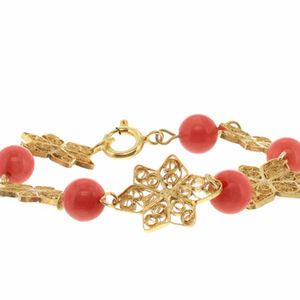 PULSERA DE 5 FLORES CON 5 CORALRES